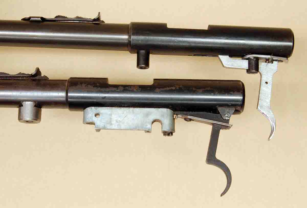 An anchor block is shown on a receiver (top) and barrel (bottom) of two .22 rifles.